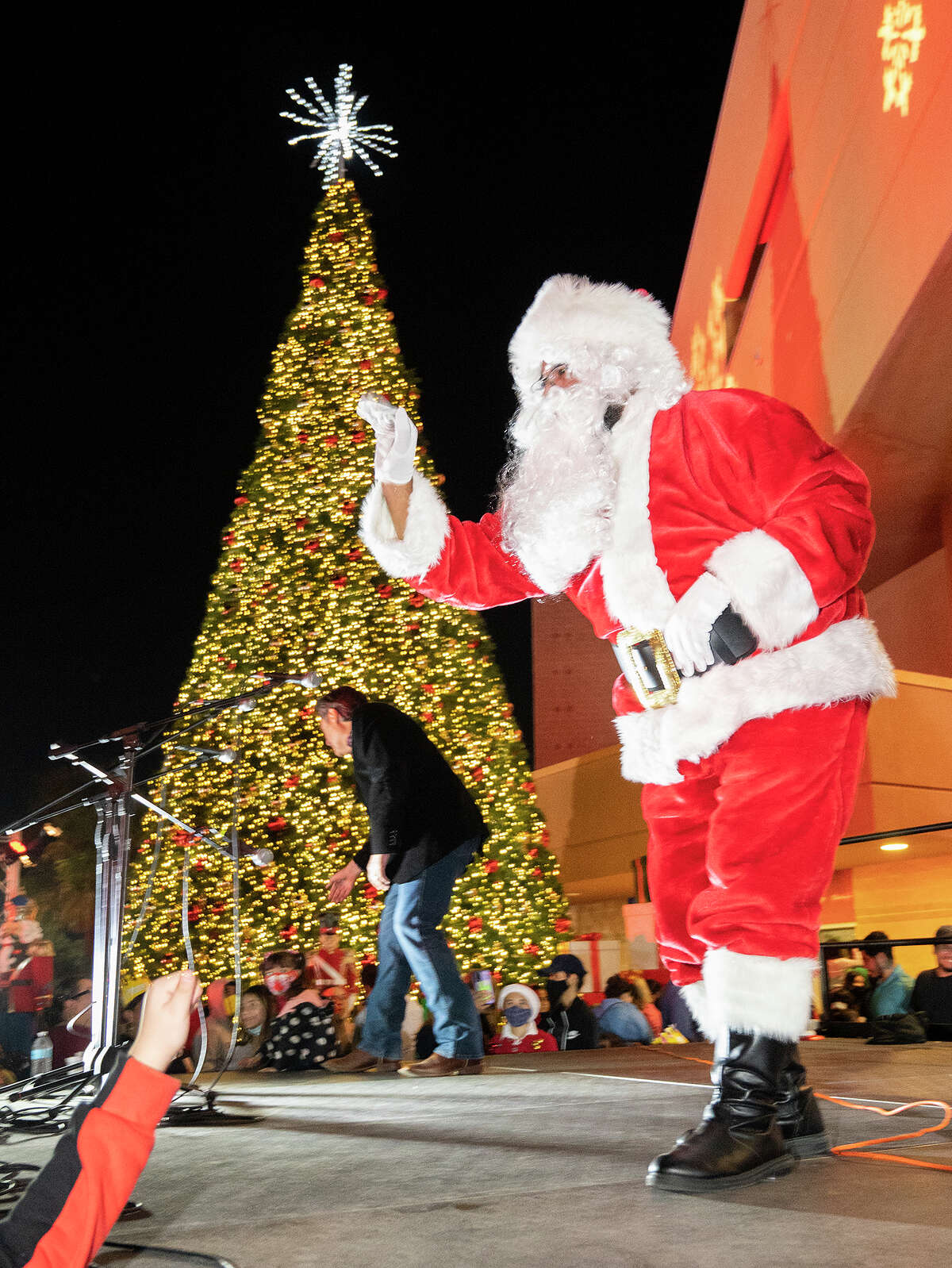 Santa Claus greets the crowd after the Christmas tree lighting on Wednesday November 1, 2021 at the Sames Auto Arena during Navidad Fest.