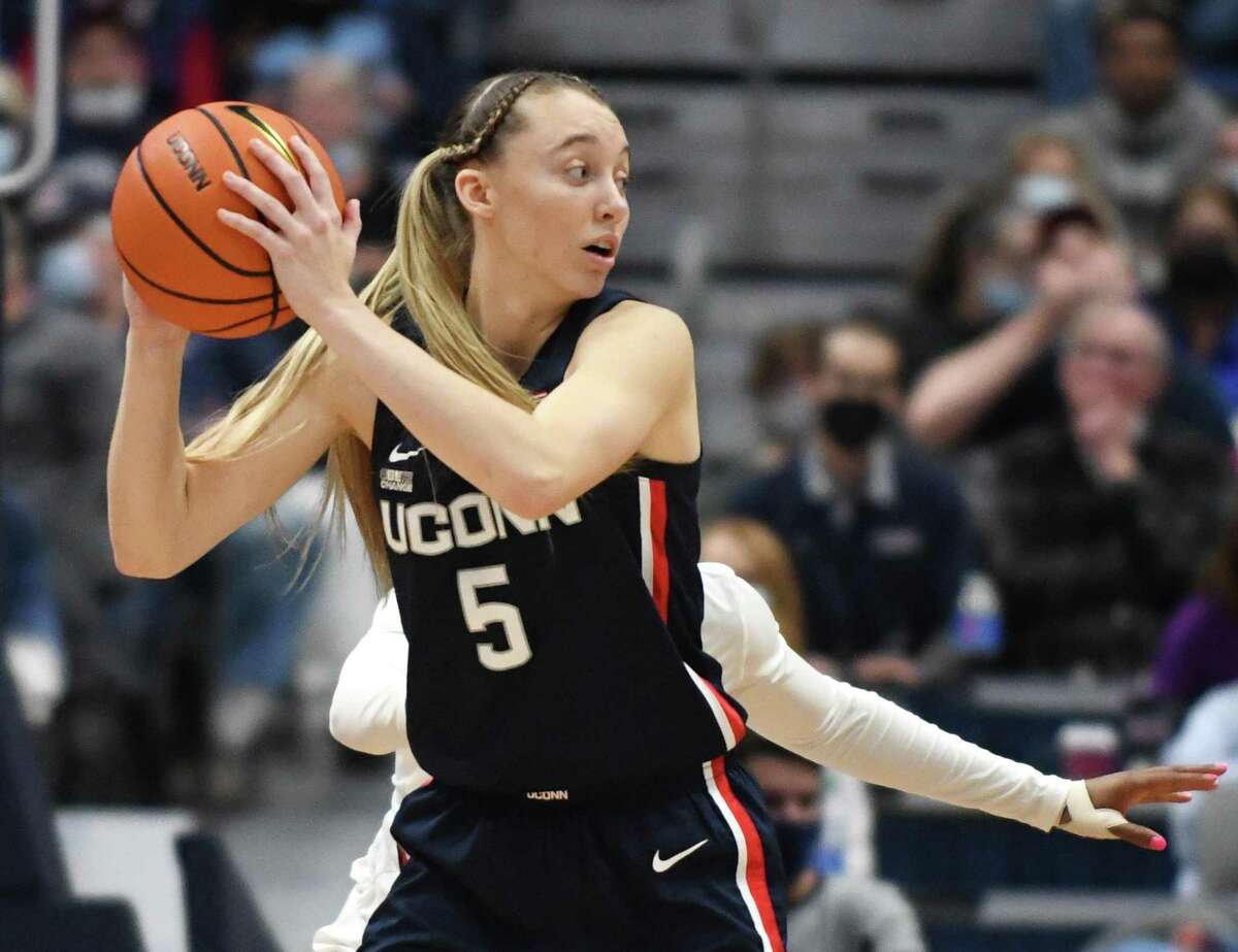 UConn guard Paige Bueckers (5) plays in UConn's season-opening 95-80 win over Arkansas in the NCAA women's basketball game at the XL Center in Hartford.