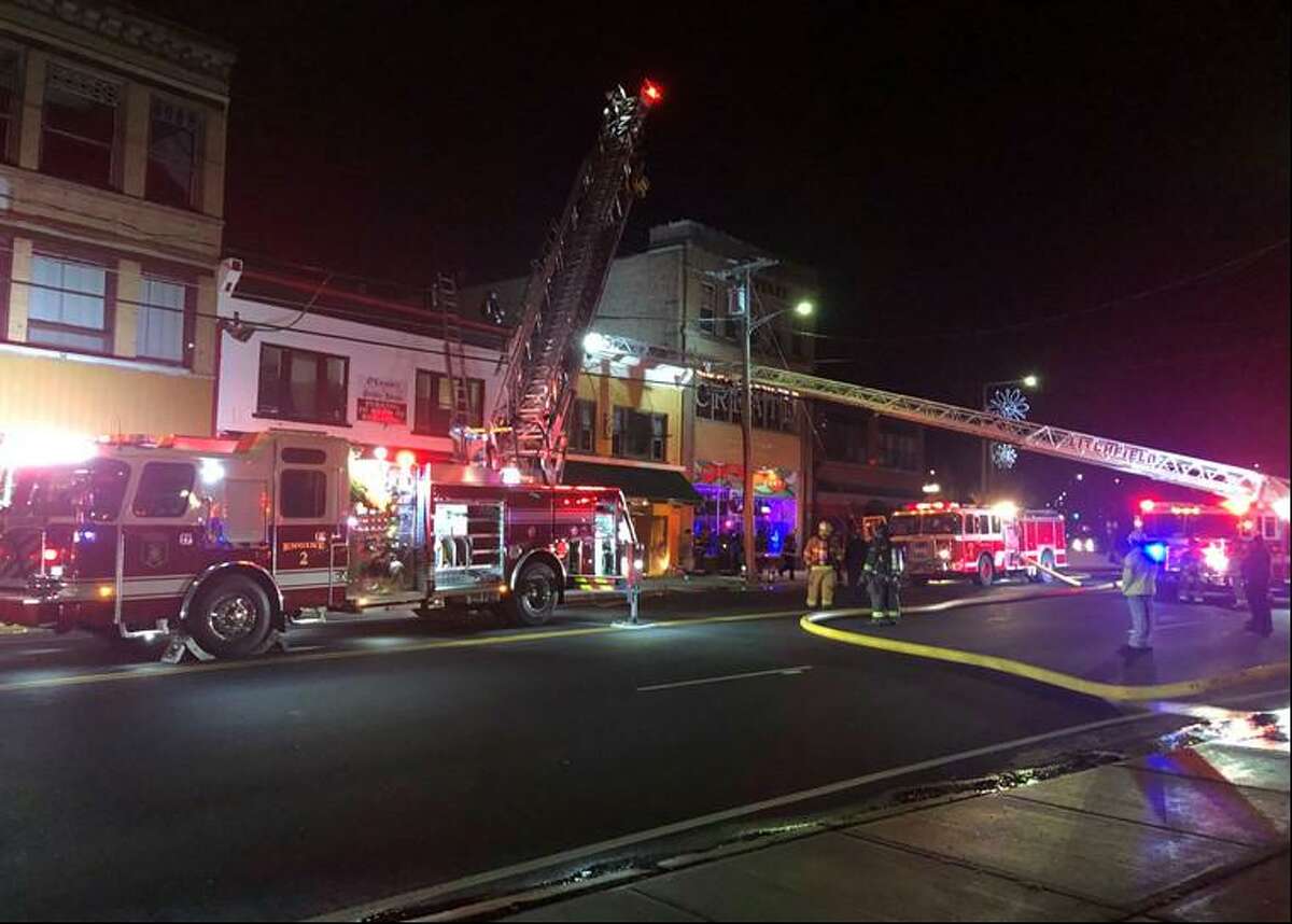 Firefighters were sent to East Main Street in Torrington, Conn., around midnight Wednesday, Dec. 2, 2021, for an activated fire alarm and found flames on the first floor.
