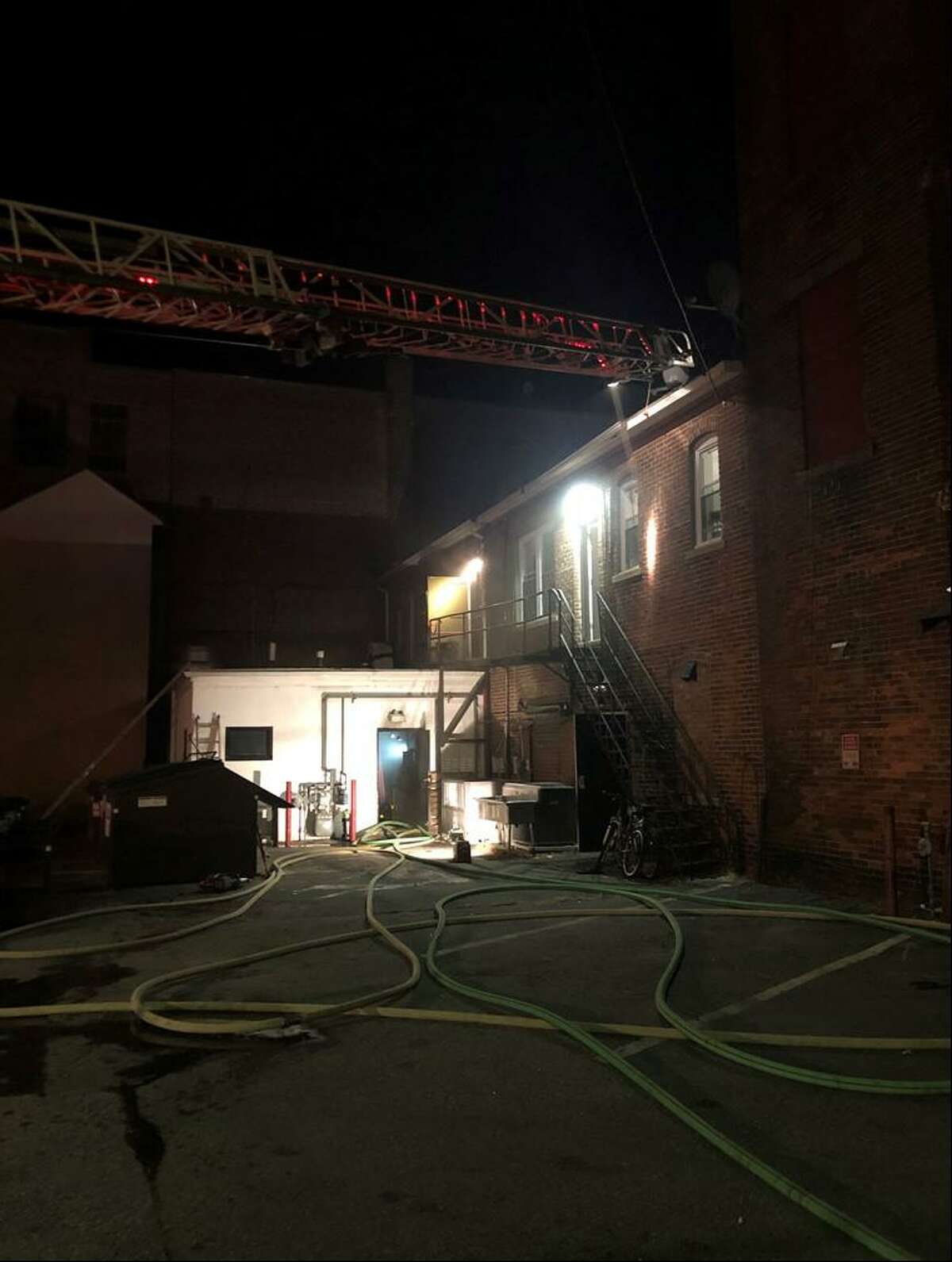 Firefighters were sent to East Main Street in Torrington, Conn., around midnight Wednesday, Dec. 2, 2021, for an activated fire alarm and found flames on the first floor.
