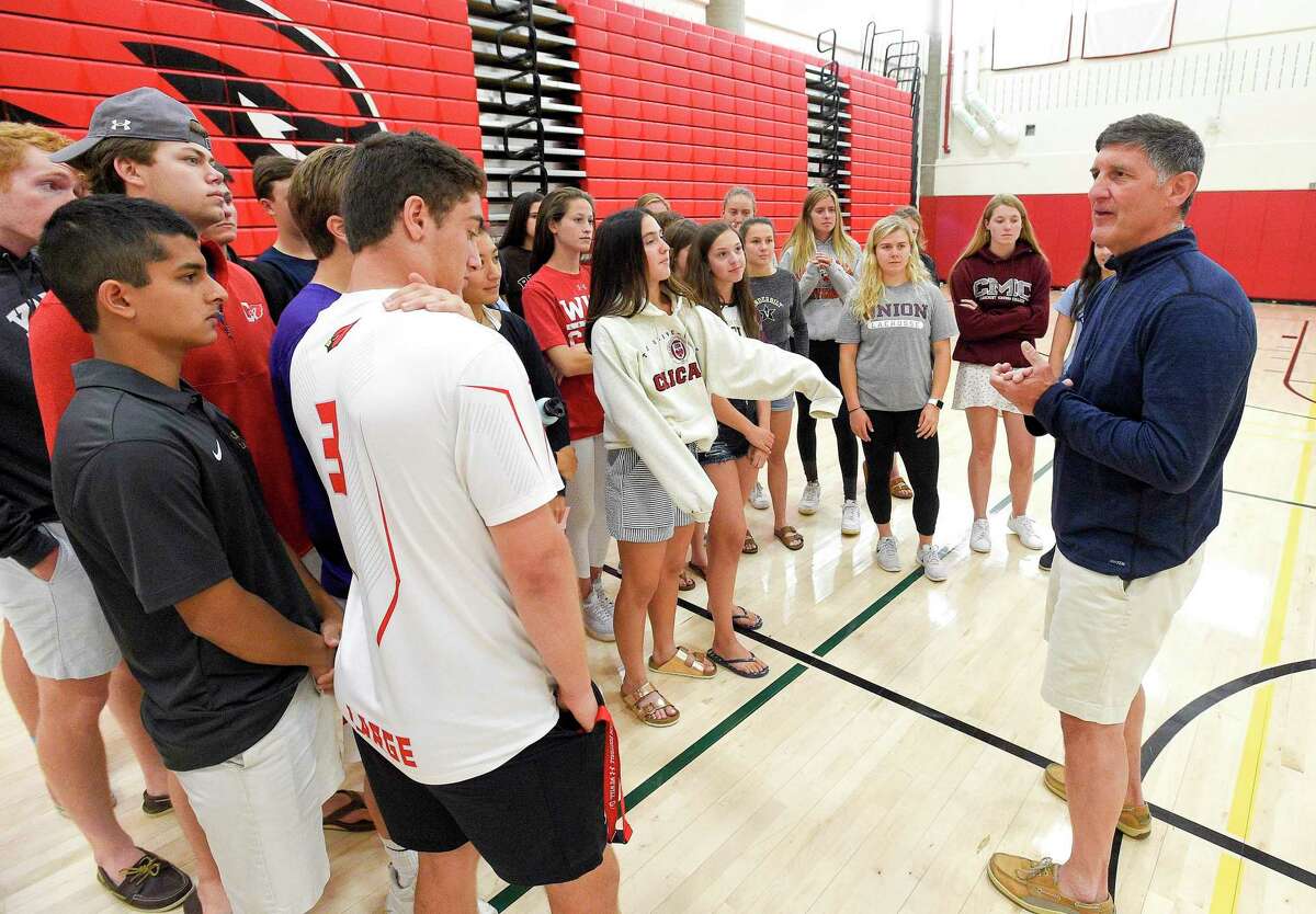 Gus Lindine, Greenwich High School Athletic Director, expresses his appreciation as GHS's college bound athletes gather one last time before graduation on June 14, 2019 in Greenwich, Connecticut.