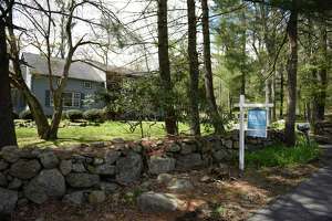 A home on Briar Brae Road listed for sale in North Stamford, Conn. Wednesday, April 22, 2020. House prices continued to show increases in Connecticut in quarter three 2021 over the same time period in 2020, although those rises were less dramatic than quarter two.
