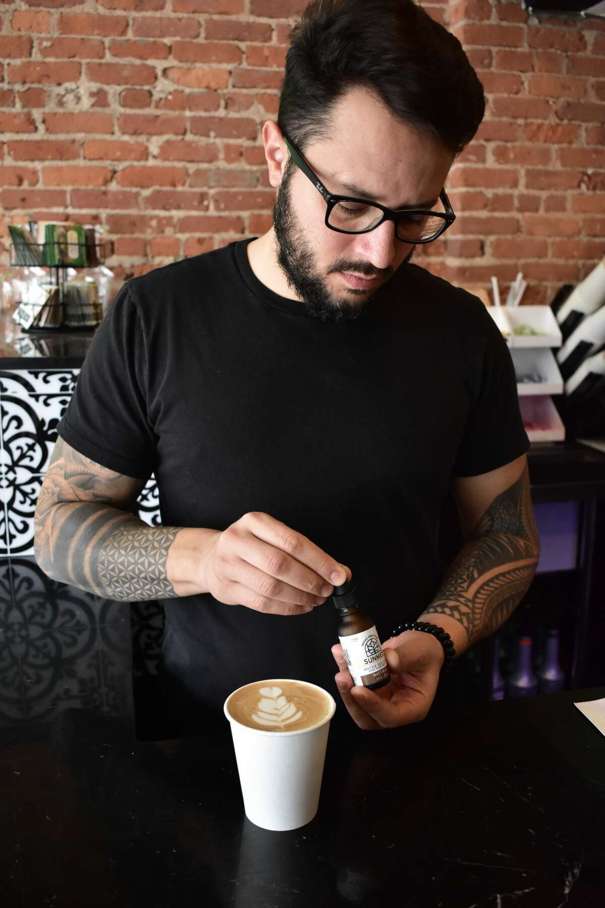 Andrea Lombardi, owner of The Breakroom a new coffee shop in South Norwalk. The coffee shop serves Italian coffee as well as CBD-infused coffee.