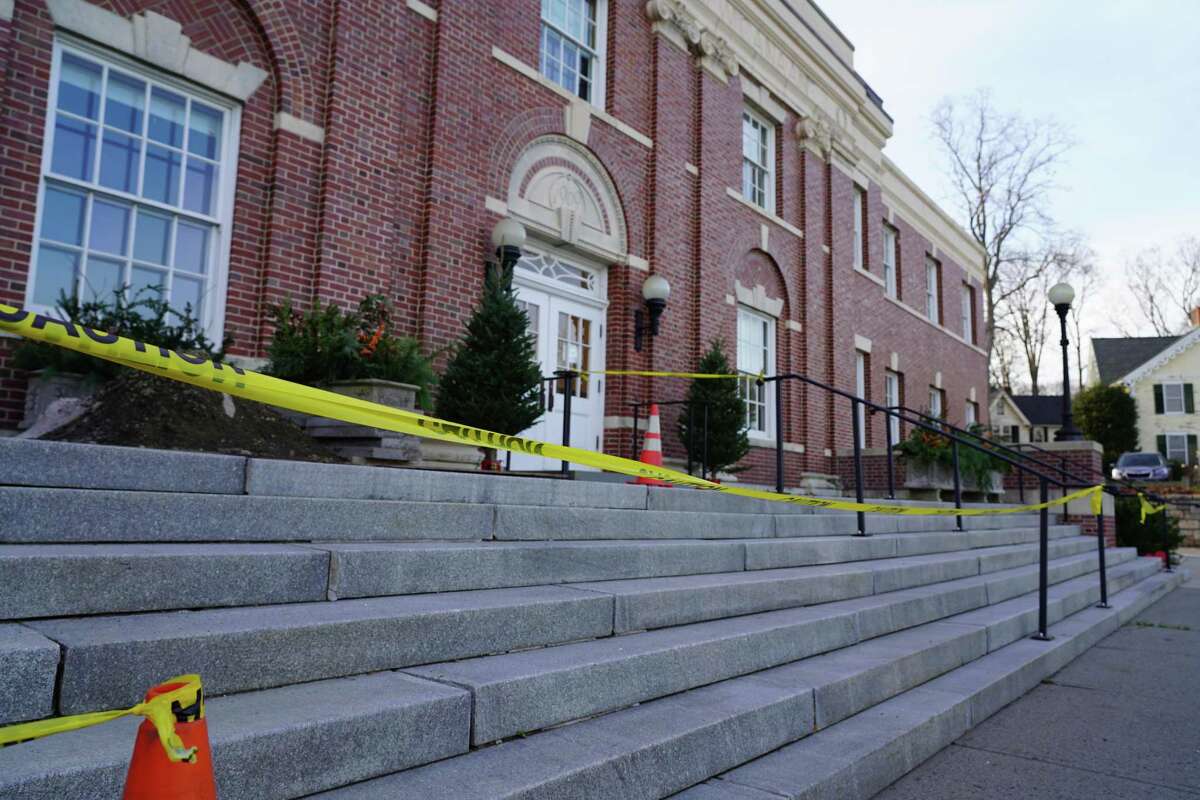 The nearly 50-foot wide steps in the front of New Canaan Town Hall may need to be taken out after during an inspection to resolve drainage issues, it was discovered that they were built on sand and not concrete. The picture was taken Dec. 1, 2021.
