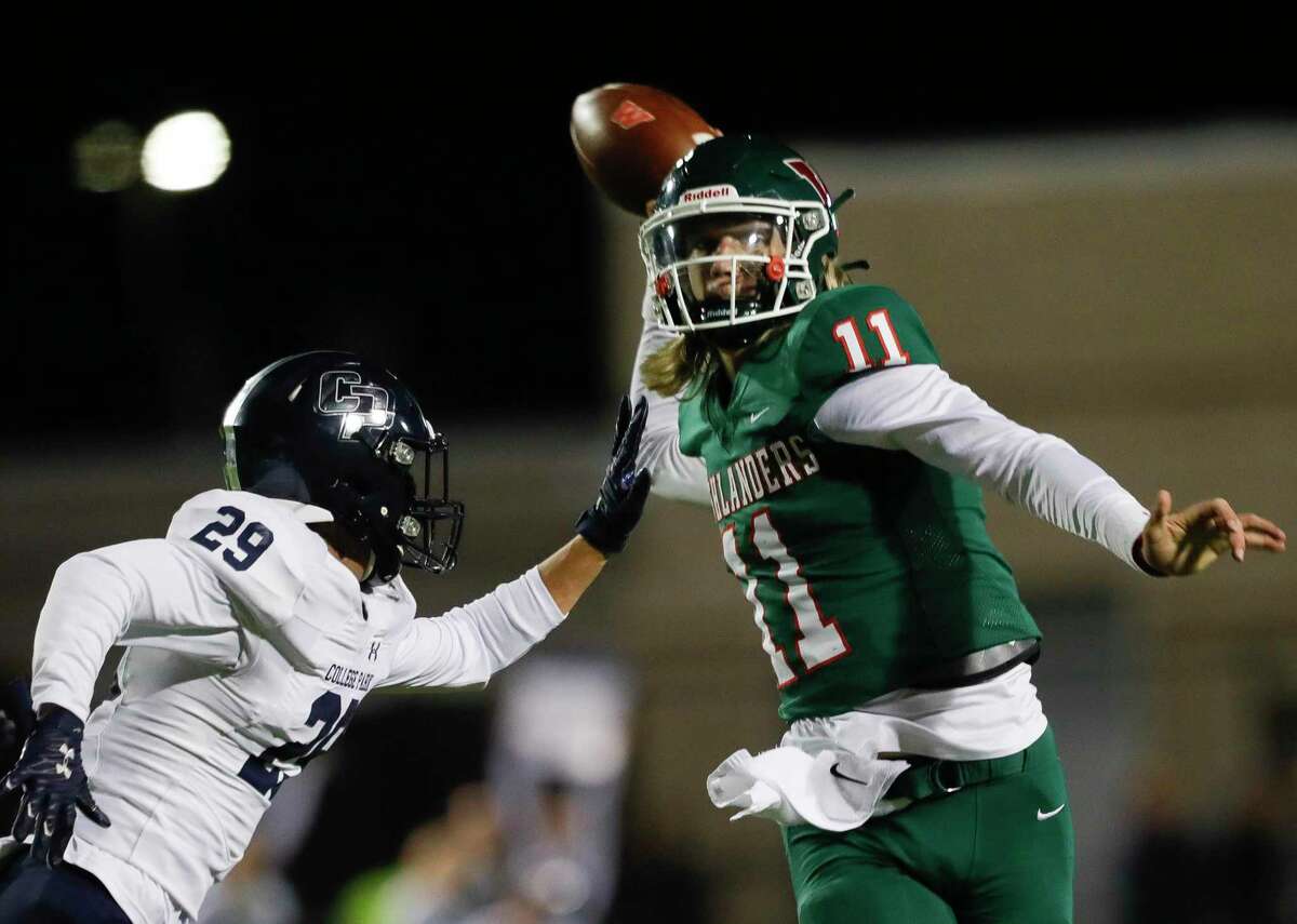 The Woodlands quarterback Mabrey Mettauer (11) throws under pressure from College Park defensive back Dylan Moore (29) during the second quarter of a high school football game at Woodforest Bank Stadium, Thursday, Nov. 4, 2021.