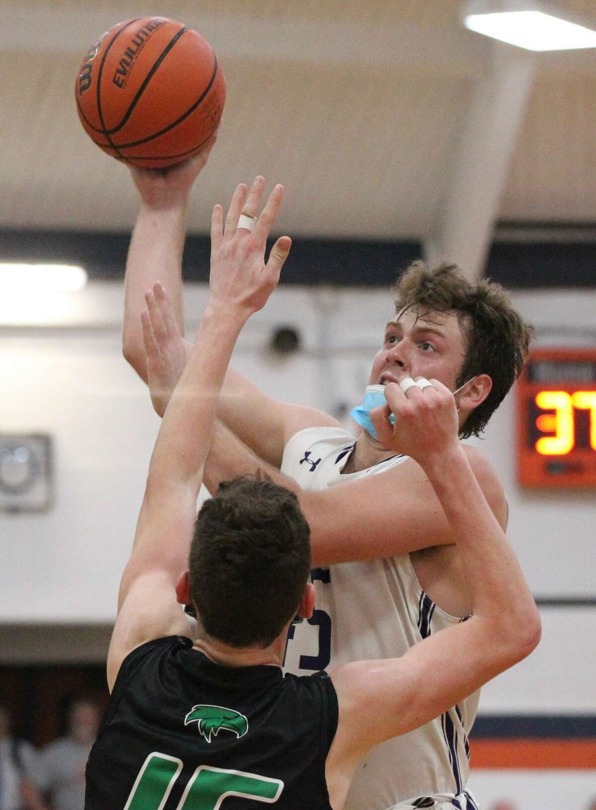 Action from the Routt boys' basketball team's game against Macon Meridian for the championship of the Gene Bergschneider Tournament in New Berlin last Saturday.