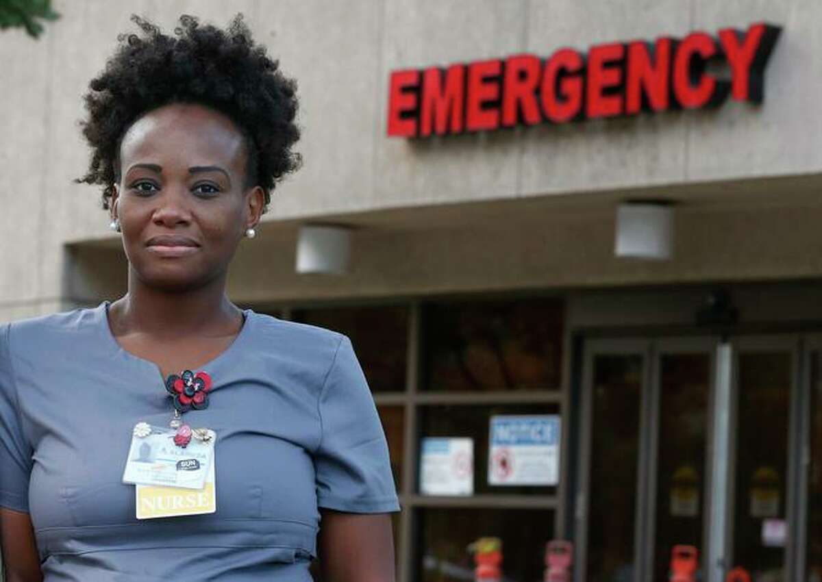 Mawata Kamara, at San Leandro Hospital in San Leandro, where she is an emergency room nurse. ‘We’re praying for the COVID vaccine for our babies,’ she said after the omicron variant of the coronavirus showed up in San Francisco on Dec. 1, its first U.S. appearance.