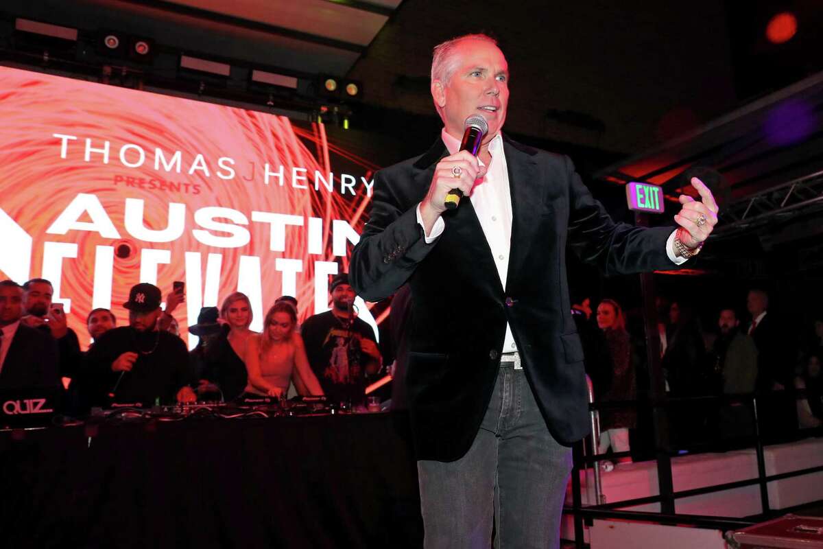 San Antonio attorney Thomas J. Henry speaks at his art and music event Austin Elevates in 2019. A woman who worked on filming the event says she was sexually assaulted by the director and is now suing Henry, his law firm and the director.