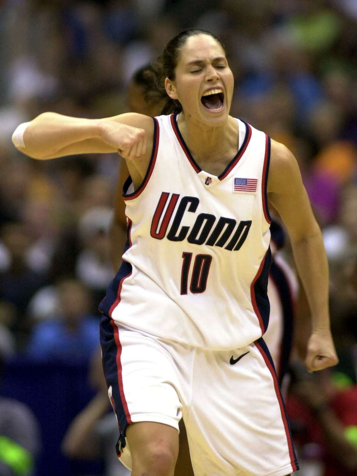 UConn guard Sue Bird screams after scoring run in the second half against Tennessee during the Final Four in 2002.