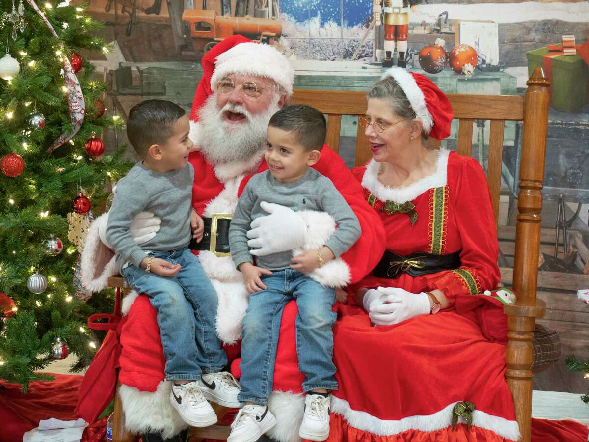 Families come out to see Santa and Mrs. Claus 12/02/2021 at Midland College Allison Fine Arts Building during the annual Holiday Evening at MC. Tim Fischer/Reporter-Telegram