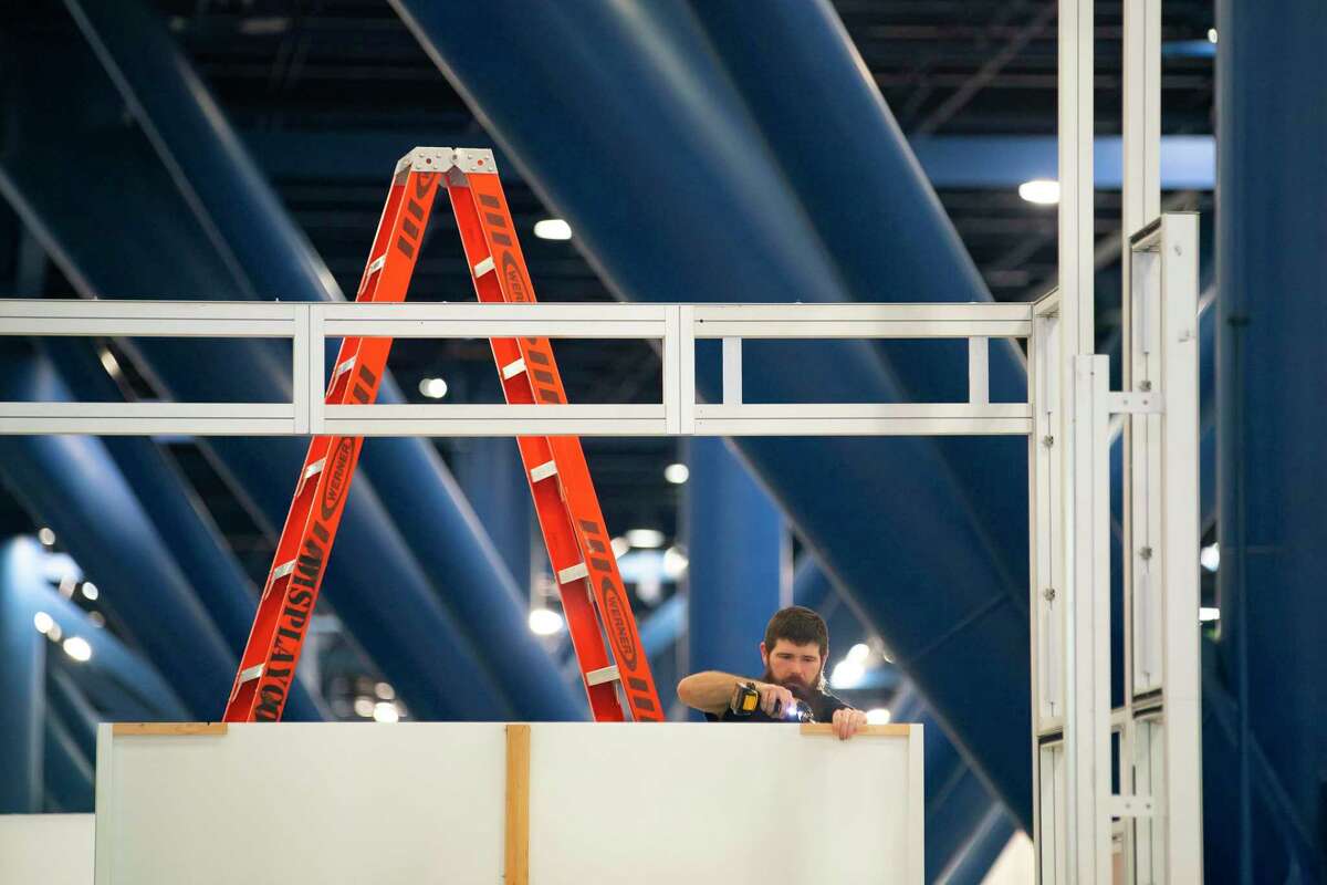 Setup continues for the World Petroleum Congress on Thursday, Dec. 2, 2021, at the George R. Brown Convention Center in Houston. The international meeting hasn’t been held in the United States since 1987 when it was held in Houston.