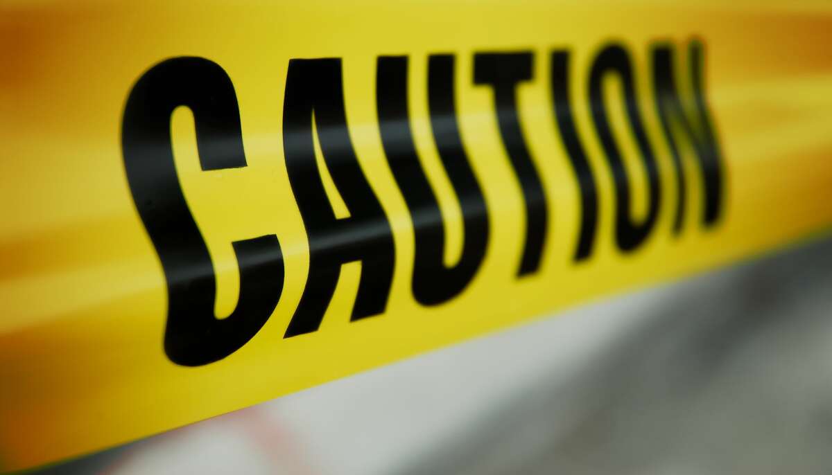 STOCK IMAGE Caution tape at crime scene