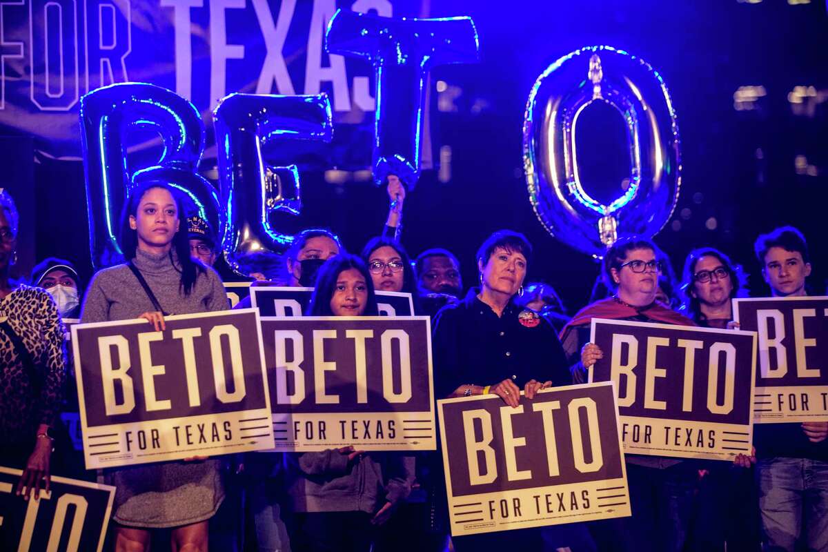Supporters of Democrat Beto O’Rourke hold Beto signs during a rally at Discovery Green as he announces that he is running for governor of Texas Friday, Nov. 19, 2021 in Houston.