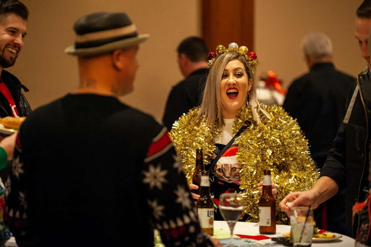 Freeland resident Stephanie Dressig chats with others at Community Wishes' Holiday Gala on Dec. 2, 2021 at the Great Hall.