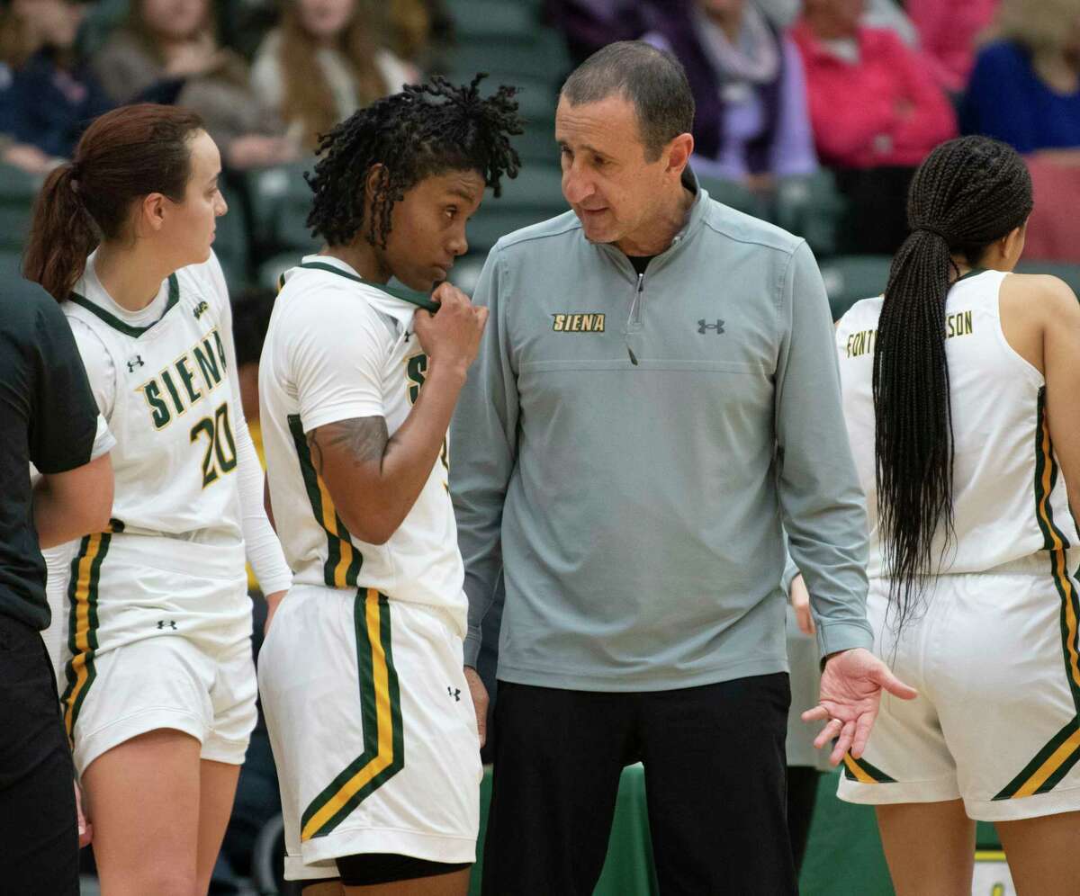 Siena women’s basketball head coach Jim Jabir is seen talking to Rayshel Brown during a game against Colgate at Siena College on Thursday, Dec. 2, 2021 in Loudonville, N.Y.