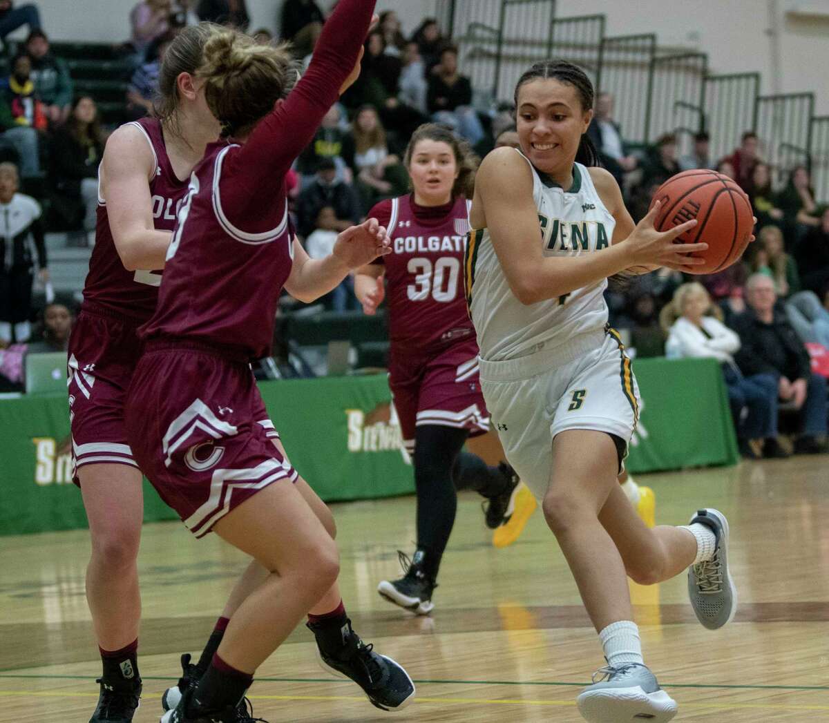 Siena’s Valencia Fontenelle-Posson drives to the hoop during a basketball game against Colgate at Siena College on Thursday, Dec. 2, 2021 in Loudonville, N.Y.