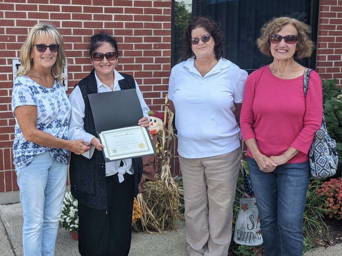 In October, North Haven Garden Club Beautification Committee handed out Certificates of Achievement to a few of the winners of this years Beautification Contest. Members of the committee visited 11 properties Aug. 28, tallied the results and contacted winners. The North Haven Residents who were able to attend the presentation were George O'Donnell, Christine Parisella and Deb Mendillo. The other winners of the contest who could not attend the presentation are James and Andrea Salemme and Peter and Rose Civitello, both holding certificates in front of their homes. Susan Zurlis and Zofia Linek received Honorable Mention Certificates.