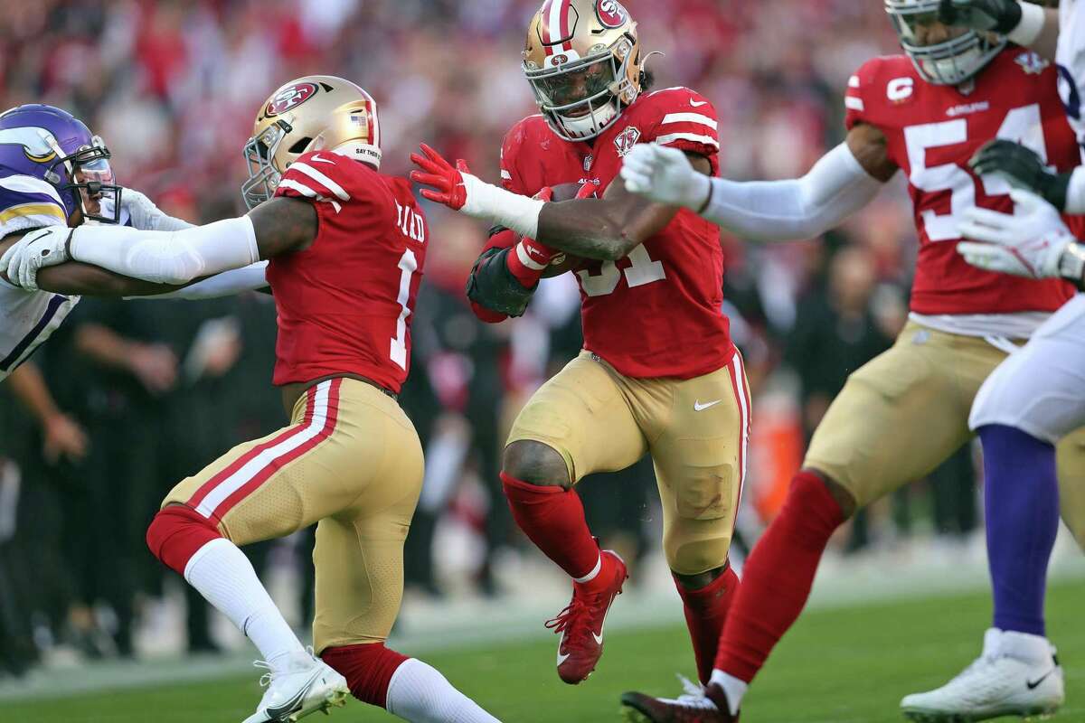 San Francisco 49ers linebacker Azeez Al-Shaair (51) stands on the sideline  during an NFL football game against the Arizona Cardinals, Sunday, Jan.8,  2023, in Santa Clara, Calif. (AP Photo/Scot Tucker Stock Photo 