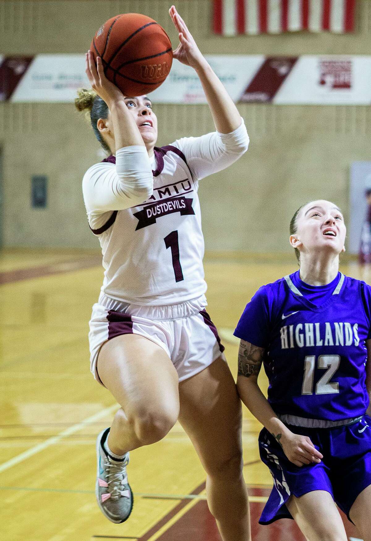 In this file photo, Texas A&M International University’s Evelyn Quiroz goes for a layup during a game against New Mexico Highlands.