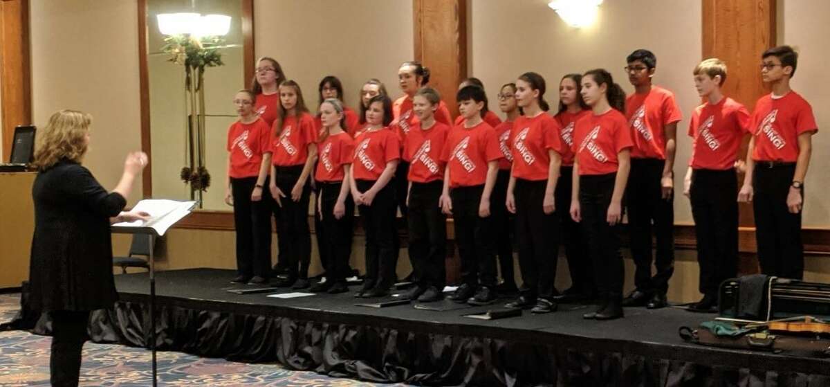 Bel Canto performs during a Midland Kiwanis Christmas meeting in 2019.