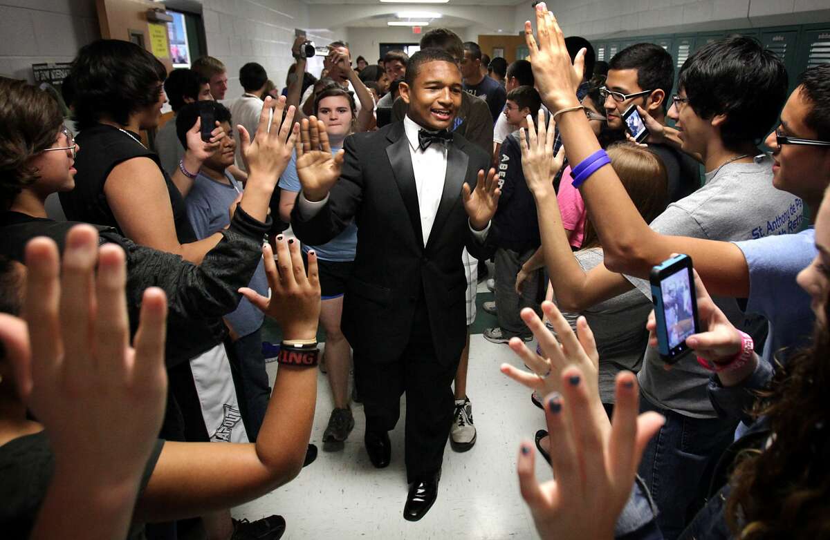 MacArthur High School Senior Darik Dillard during his attempt to set a new Guinness World Record of the most high-five's in an hour. He held the record until 2016. 