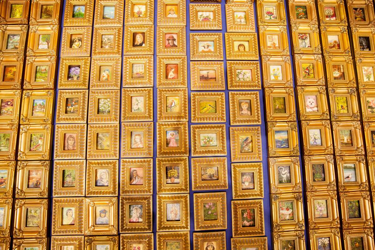 Five thousand tiny paintings were spread across 10 tables during a reception for artist Martha I. Ochoa on Sunday Nov. 22, 2015 at St. Mary's Hall. Ochoa set a Guinness World Record with her tiny paintings.