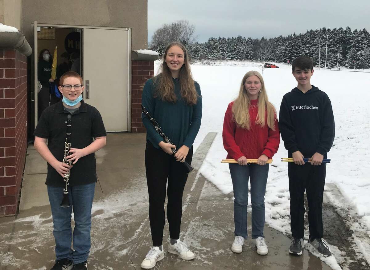 Christian Erlandson (left), Emily Sullivan, Sarah Huber and Jack O'Donnell earned All-State honors from the Michigan School Band and Orchestra Association.