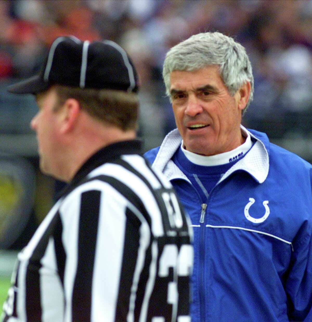 Indianapolis Colts coach Jim Mora, right, questions field judge Steve Zimmer about a call made in the Colts’ game against the Baltimore Ravens in 2001.