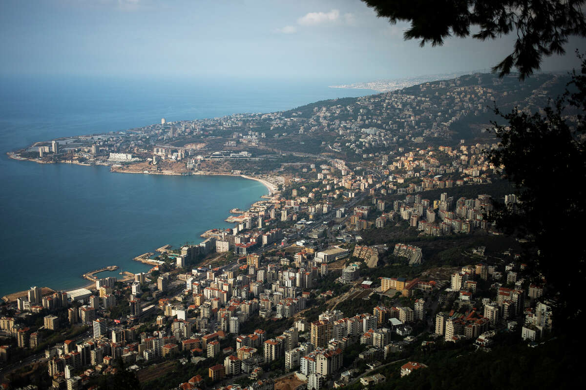The city of Jounieh and the Mediterranean Sea are seen from the mountainside at Harissa, a key Christian pilgrimage site with a shrine dedicated to Our Lady of Lebanon, on Monday, Nov. 22, 2021.