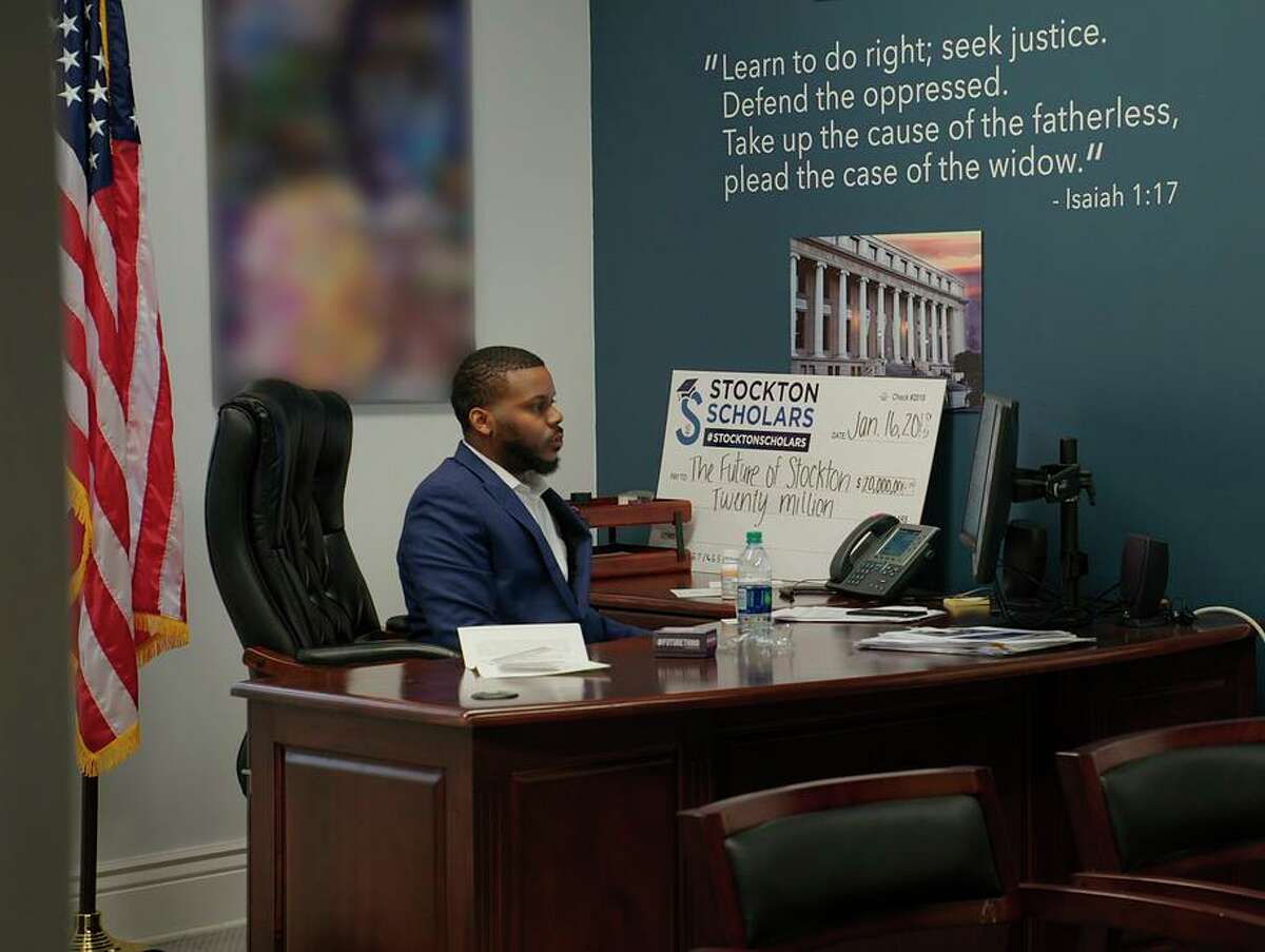 Michael Tubbs, then mayor of Stockton, works at his desk in March 2018.