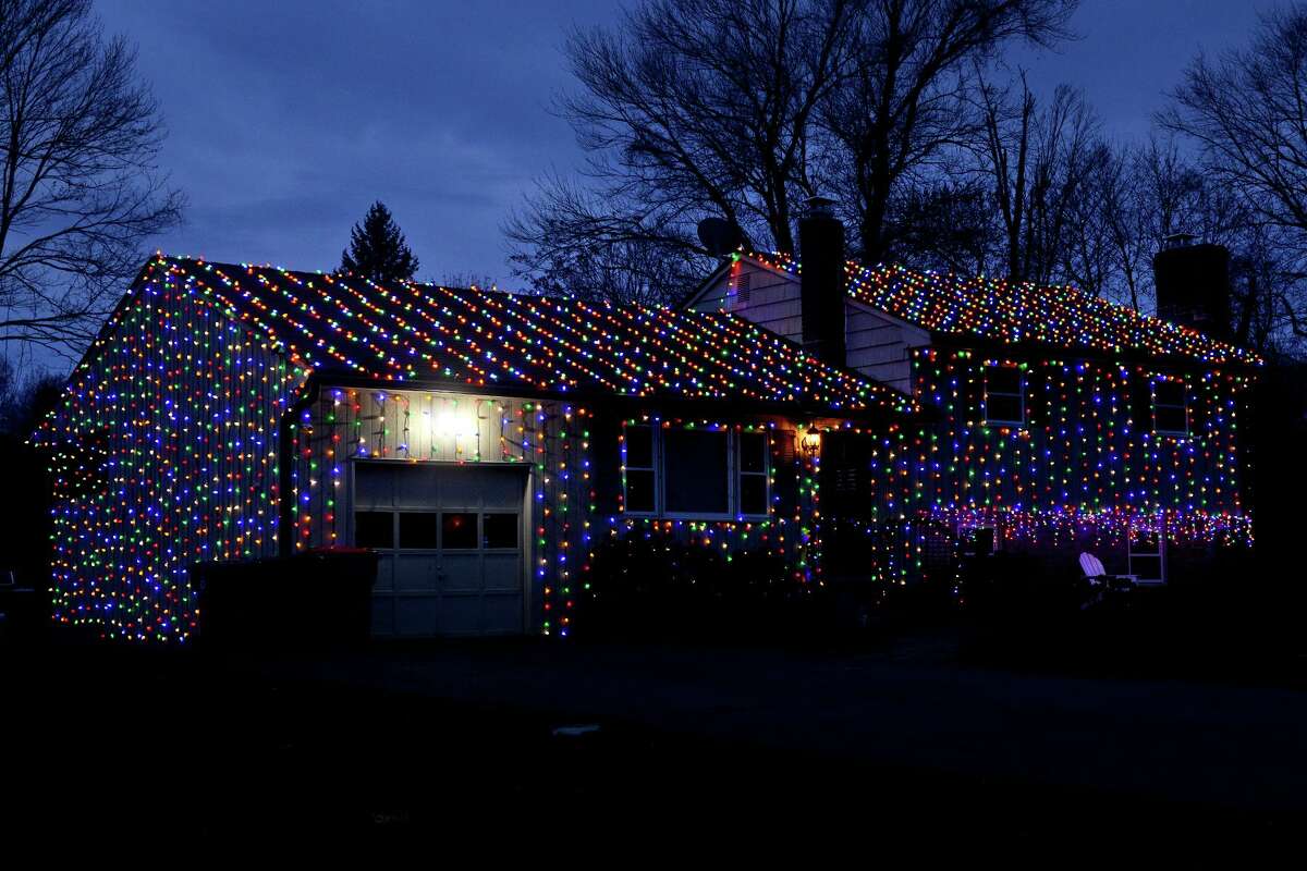 Christmas lights decorate a home on Shady Lane, in Trumbull, Conn. Dec. 2, 2021.
