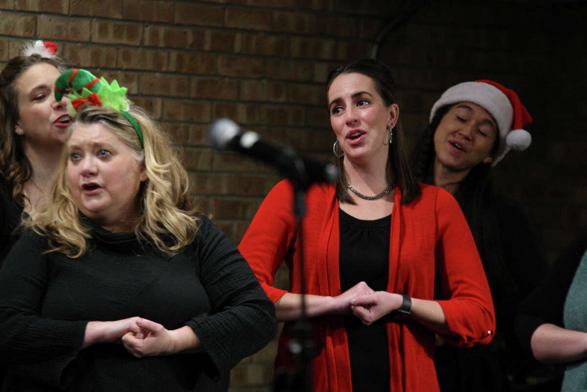 The Michigan MOMsemble performs a holiday-themed show Wednesday, Dec. 1, 2021 at Creative 360 in Midland.