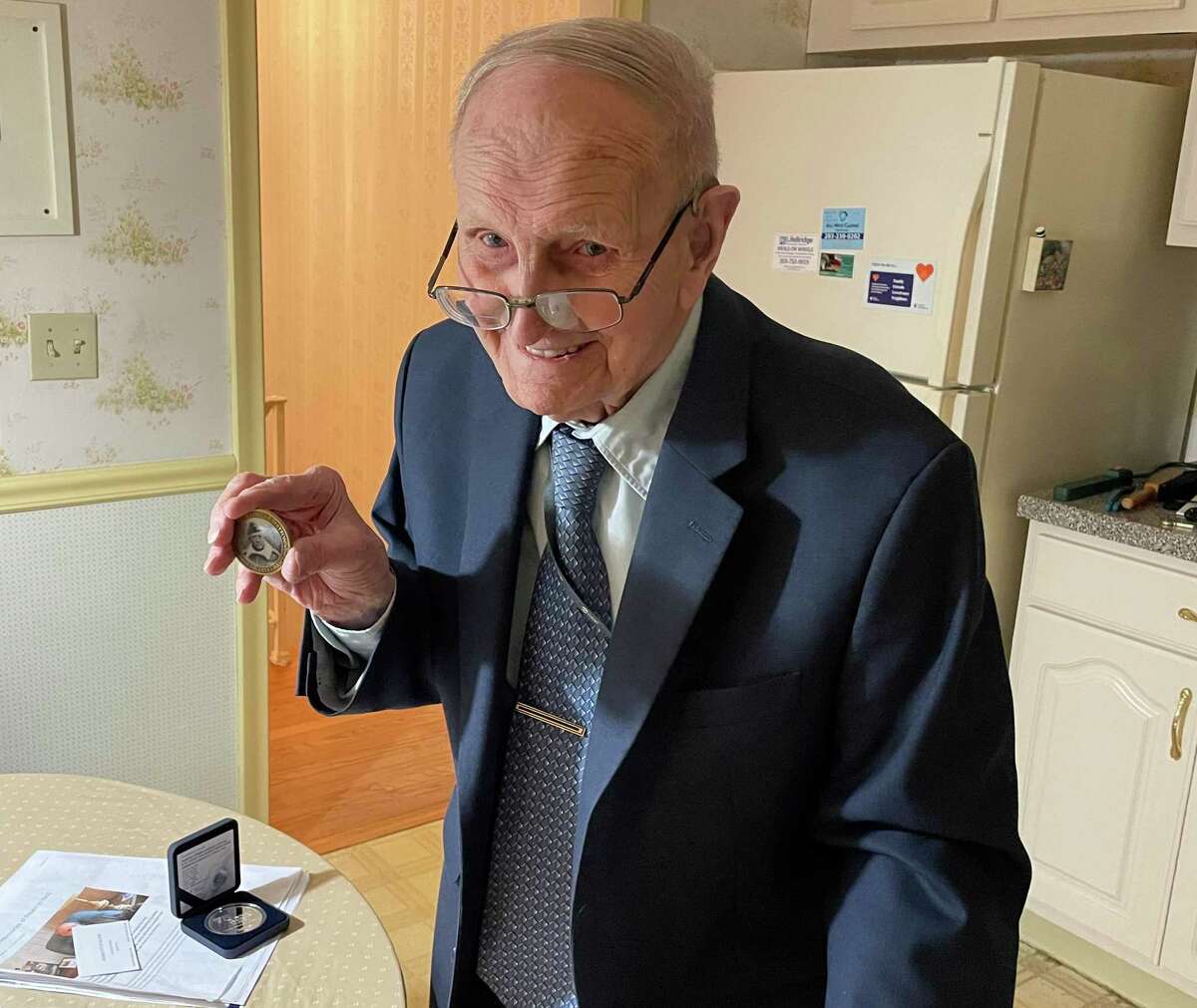 Robert Muthersbaugh, a 100-year-old Hamden resident, has been honored for his participation in the liberation of Czechoslovakia during World War II. He served as a radio operator.