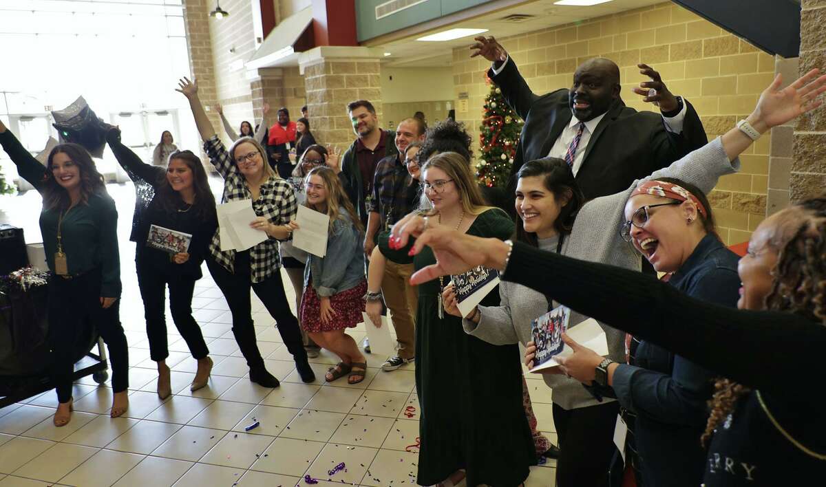Lamar Consolidated ISD staff members celebrate after receiving $1,000 retention stipends on Tuesday, Nov. 30.