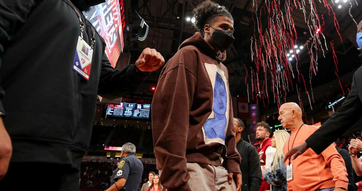 Houston Rockets guard Jalen Green (0) walks off the court after the Rockets defeated the Oklahoma City Thunder 102-89 at Toyota Center on Monday, Nov. 29, 2021, in Houston.