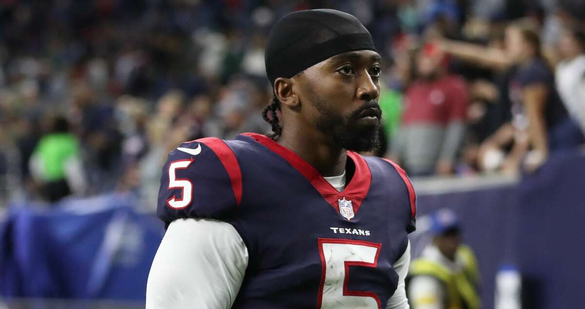 Houston Texans quarterback Tyrod Taylor (5) walks off the field after the Texans 21-14 loss to the New York Jets after an NFL football game at NRG Stadium, Sunday, Nov. 28, 2021 in Houston.