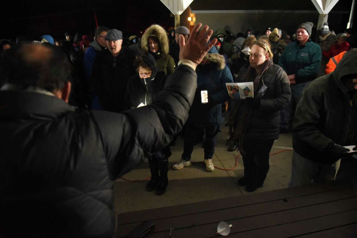 A prayer vigil is held in Shafer Park, across from Duanesburg Elementary School, in memory of the mother and 5-year-old killed and the toddler injured in the domestic violence incident in Duanesburg on Wednesday on Friday, Dec. 3, 2021 in Duanesburg, N.Y.