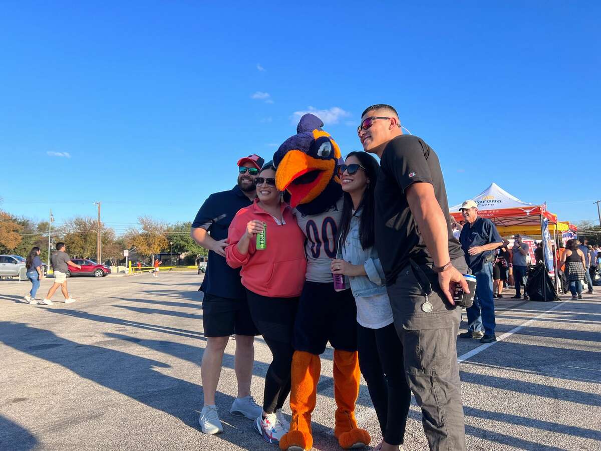 UTSA fans tailgate at the Alamodome before the Conference USA title game Friday, Dec. 3, 2020