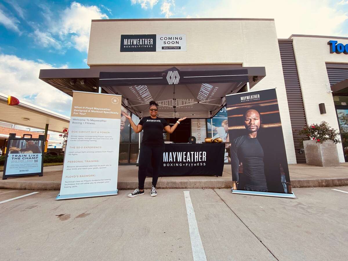 Franchise owner Teresa Welch poses in front of Mayweather Boxing + Fitness. The boutique gym is slated to open in early 2022 at 22377 Bellaire Blvd. in Richmond.