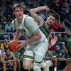 Siena College senior Jackson Stormo looks for help while being defended by Manhattan College senior Nick Brennan during the Metro Atlantic Athletic Conference opener at the Times Union Center in Albany, New York on Friday, Dec. 3, 2021 (Jim Franco/Special to the Times Union)