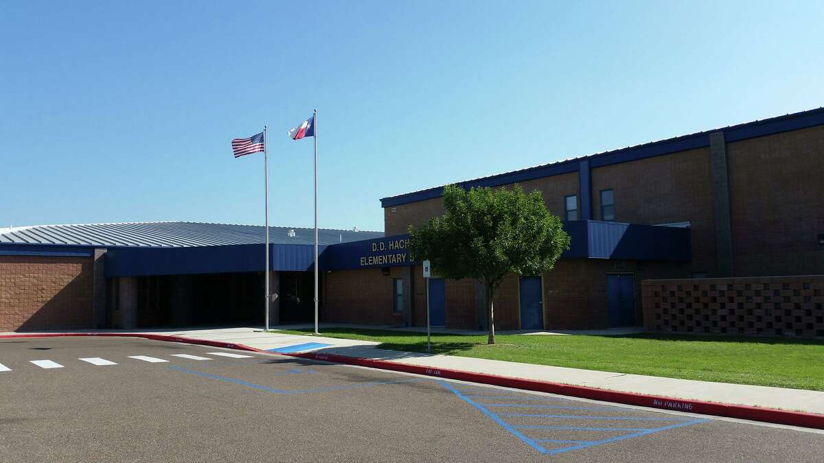 Pictured is D.D. Hachar Elementary School. Two bodies were found on Friday on the street about a block away from the school, according to Laredo police.