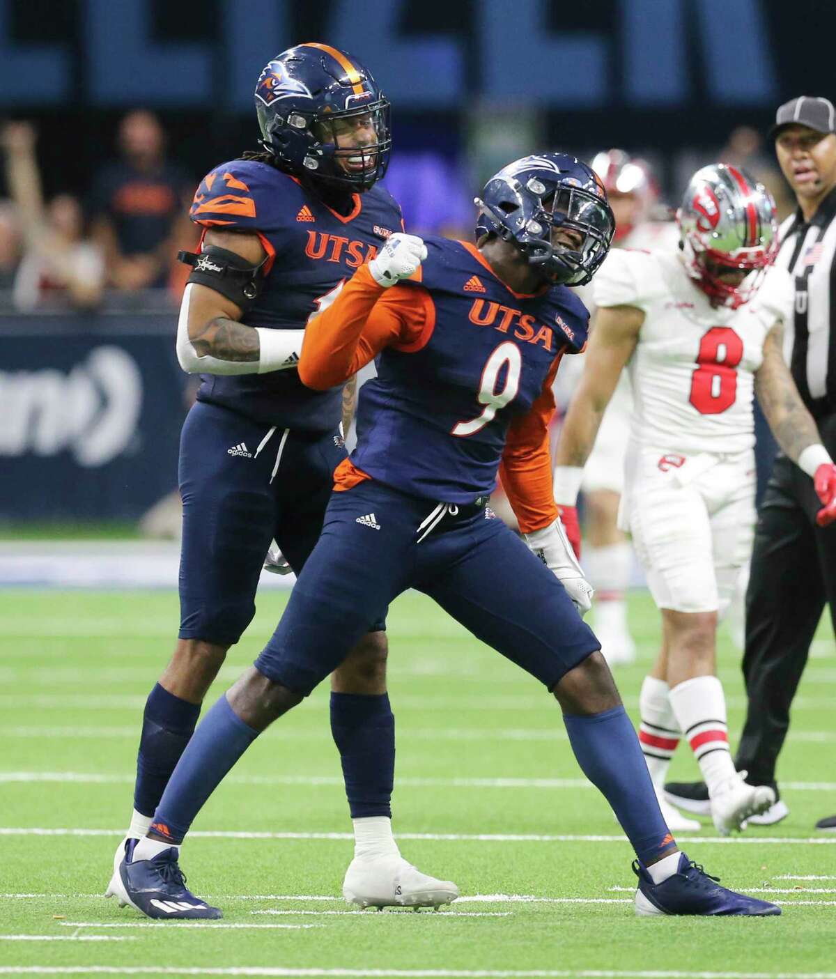 UTSA's Clarence Hicks (09) ?celebrates after sacking Western Kentucky quarterback Bailey Zappe (04) during the 2021 Conference USA Championship football game at the Alamodome on Friday, Dec. 3, 2021.