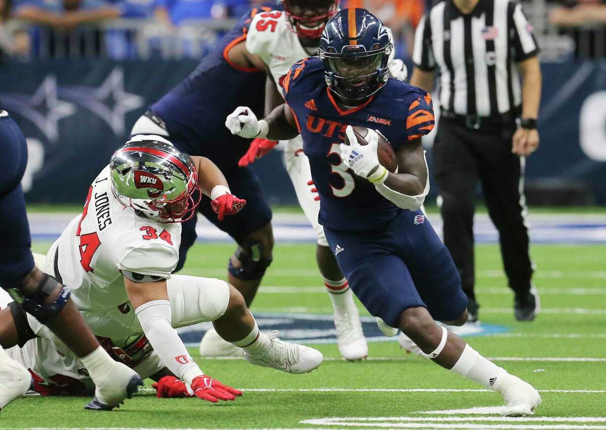 UTSA's running back Sincere McCormick (03) breaks out for a 65-yard touchdown run against Western Kentucky in the 2nd quarter during the 2021 Conference USA Championship football game at the Alamodome on Friday, Dec. 3, 2021.