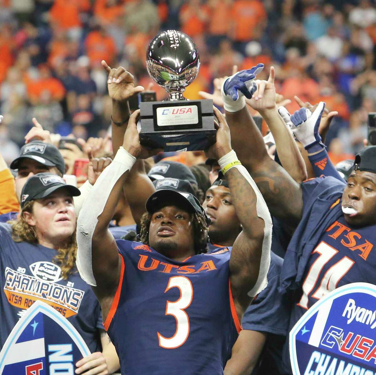 UTSA's running back Sincere McCormick (03) earns the most valuable player trophy after UTSA defeats Western Kentucky in the 2021 Conference USA Championship football game at the Alamodome on Friday, Dec. 3, 2021. The Roadrunners defeated the Hilltoppers, 49-41, to win the championship.