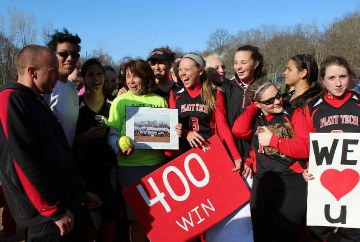 Sue Murphy celebrates her 400th win as Platt Tech softball coach in 2013.