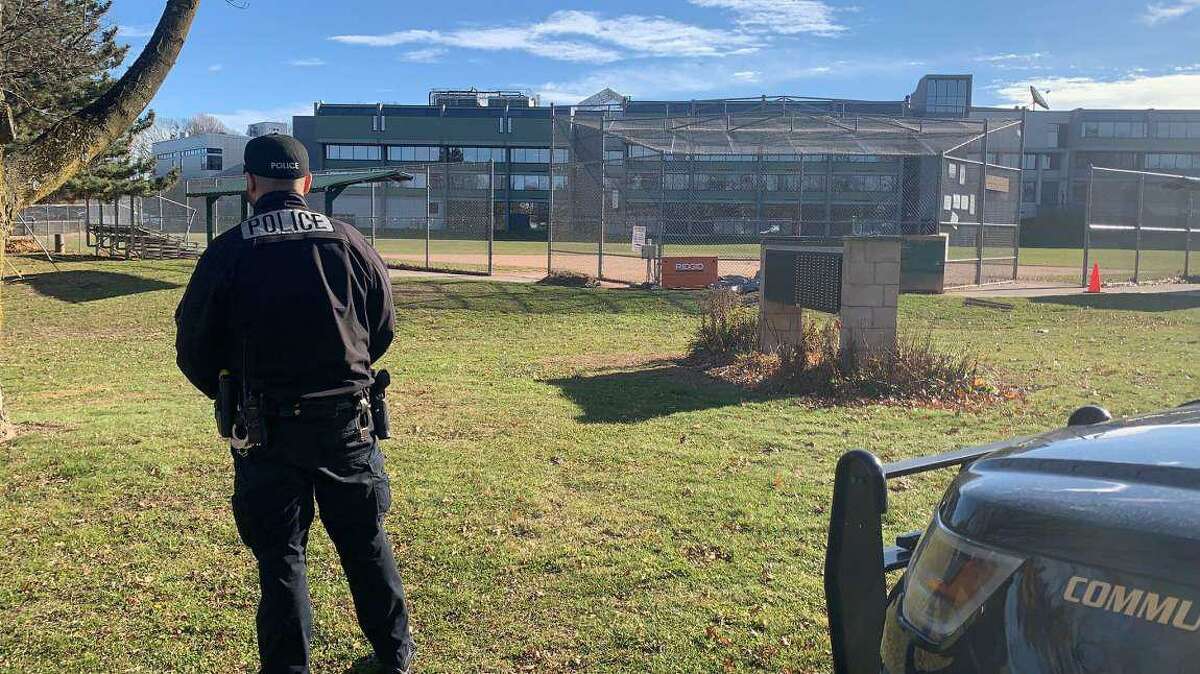 Officers were on scene at Norwalk High School in Norwalk, Conn., on Friday, Dec. 3, 2021, following a threat that later turned out to be a hoax.