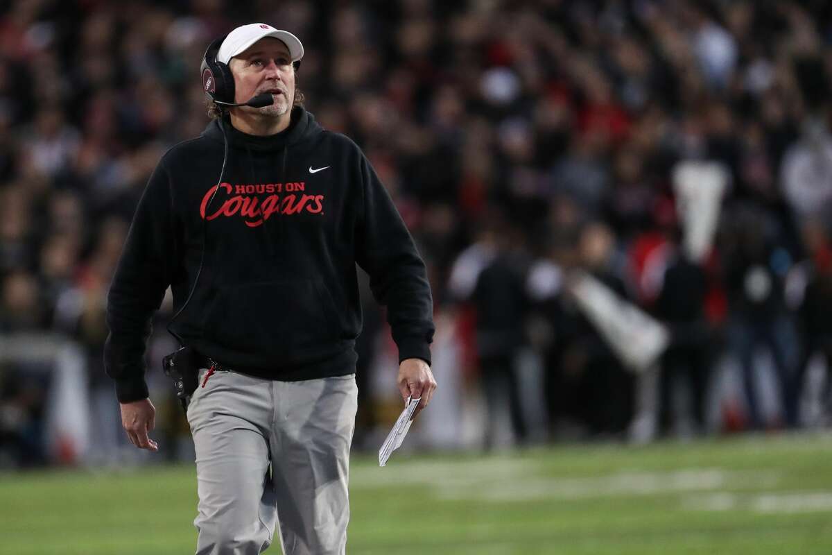 Houston head coach Dana Holgorsen walks off the sidelines during the second quarter of the AAC Championship game Saturday, Dec. 4, 2021 in Cincinnati.