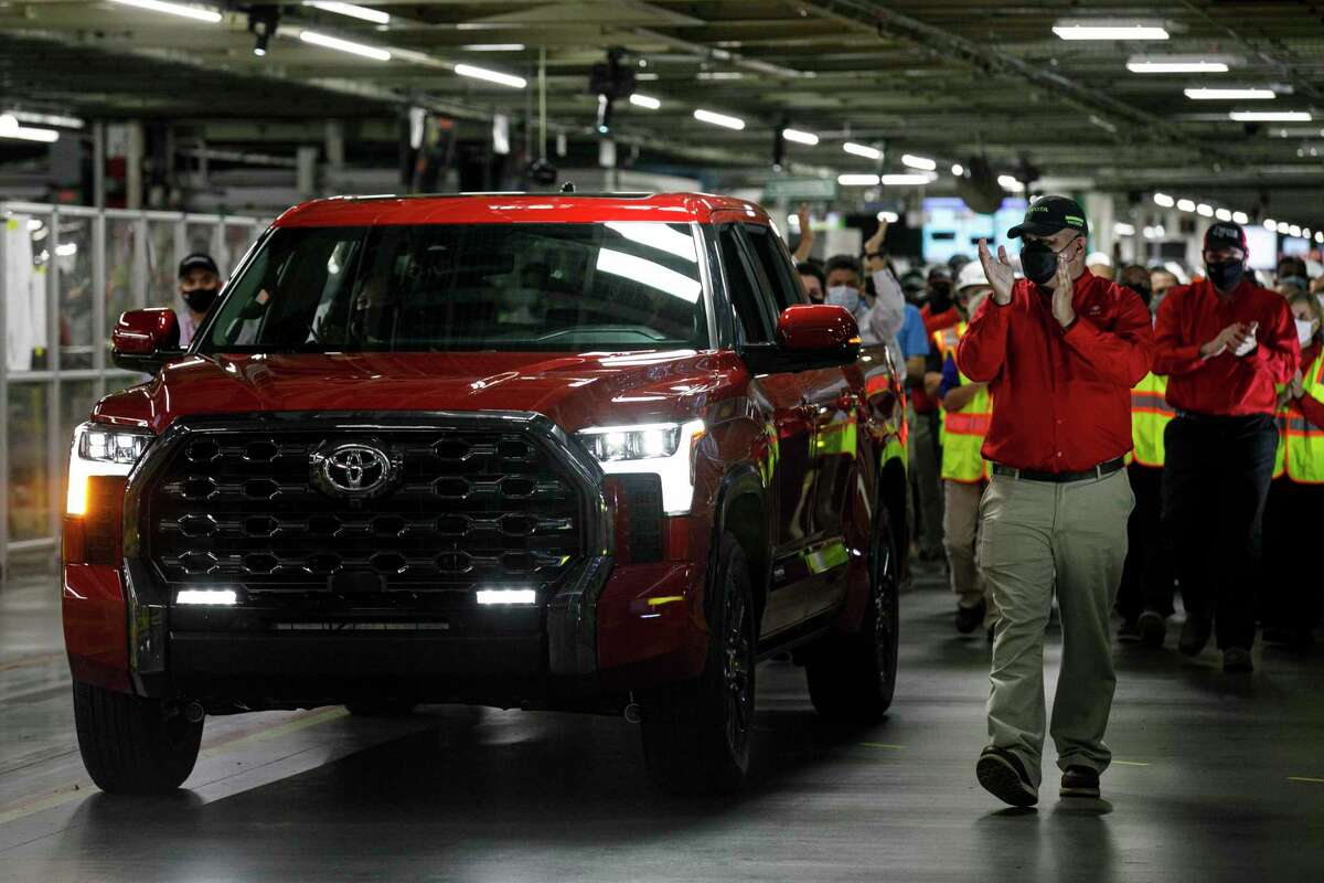 A new 2022 Tundra truck leads 400 Toyota team members down the factory floor at Toyota Motor Manufacturing Texas in on the South Side of San Antonio, Texas, during the unveiling ceremony held Friday morning, Dec. 3, 2021.