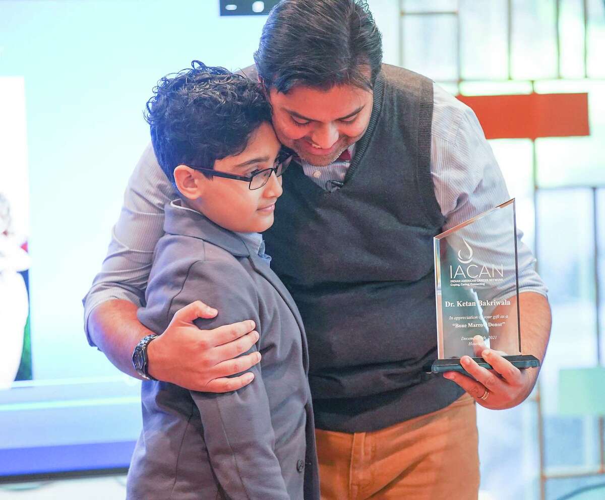 Rushi Gandhi, 11, meets Dr. Ketan Bakriwali for the first time at an awareness event for IACAN and Be the Match in Sugar Land on Saturday, Dec. 4, 2021. Dr. Bakriwali was a marrow match for Rushi, who had a rare blood disorder.