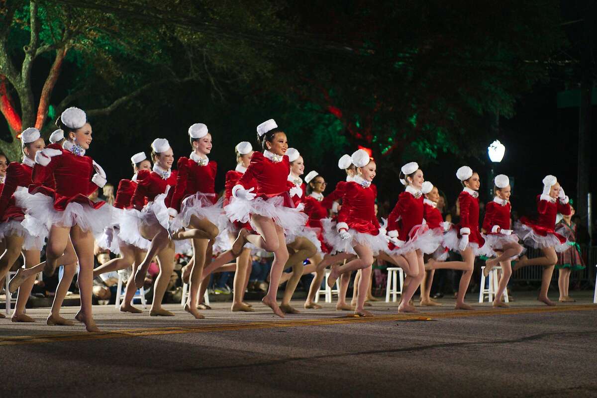 Dancers from Contempo Dance Center perform during the League City Holiday in the Park Grand Night Parade Saturday, Dec. 4, 2021.